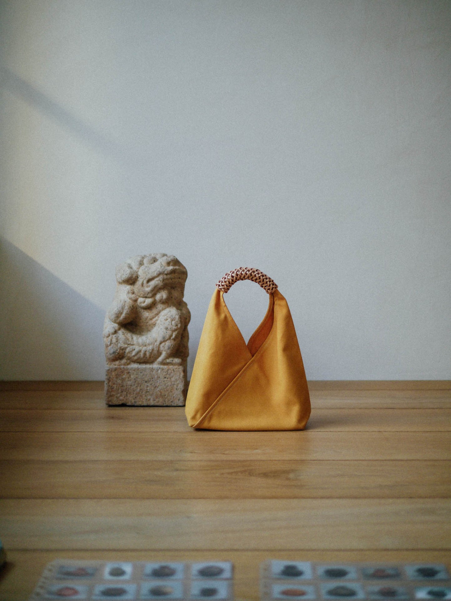 KAMARO'AN Woven Triangle Bag