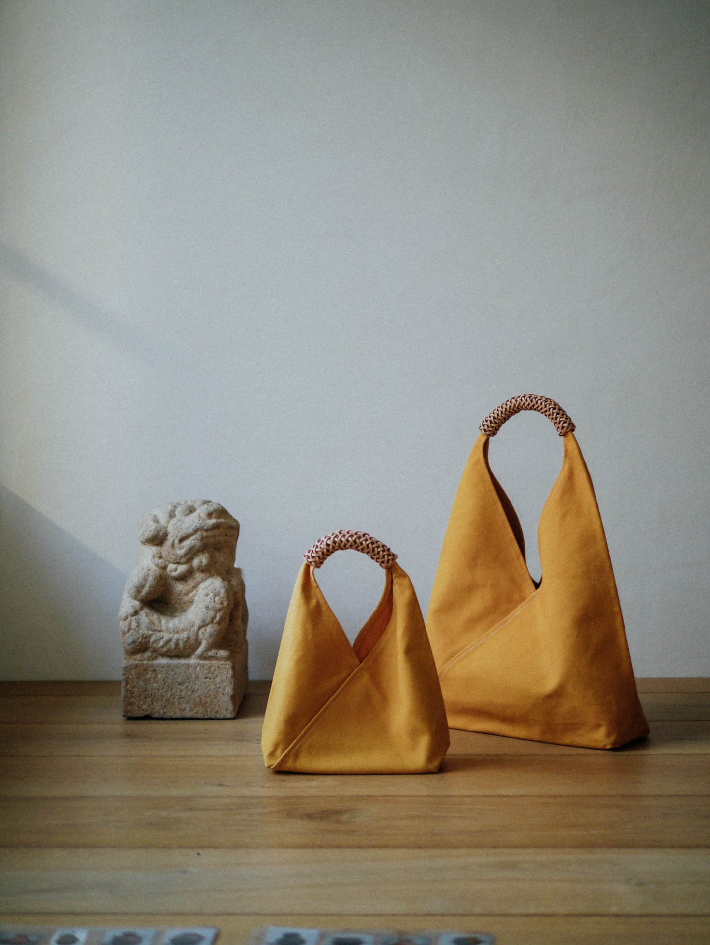 KAMARO'AN Woven Triangle Bag