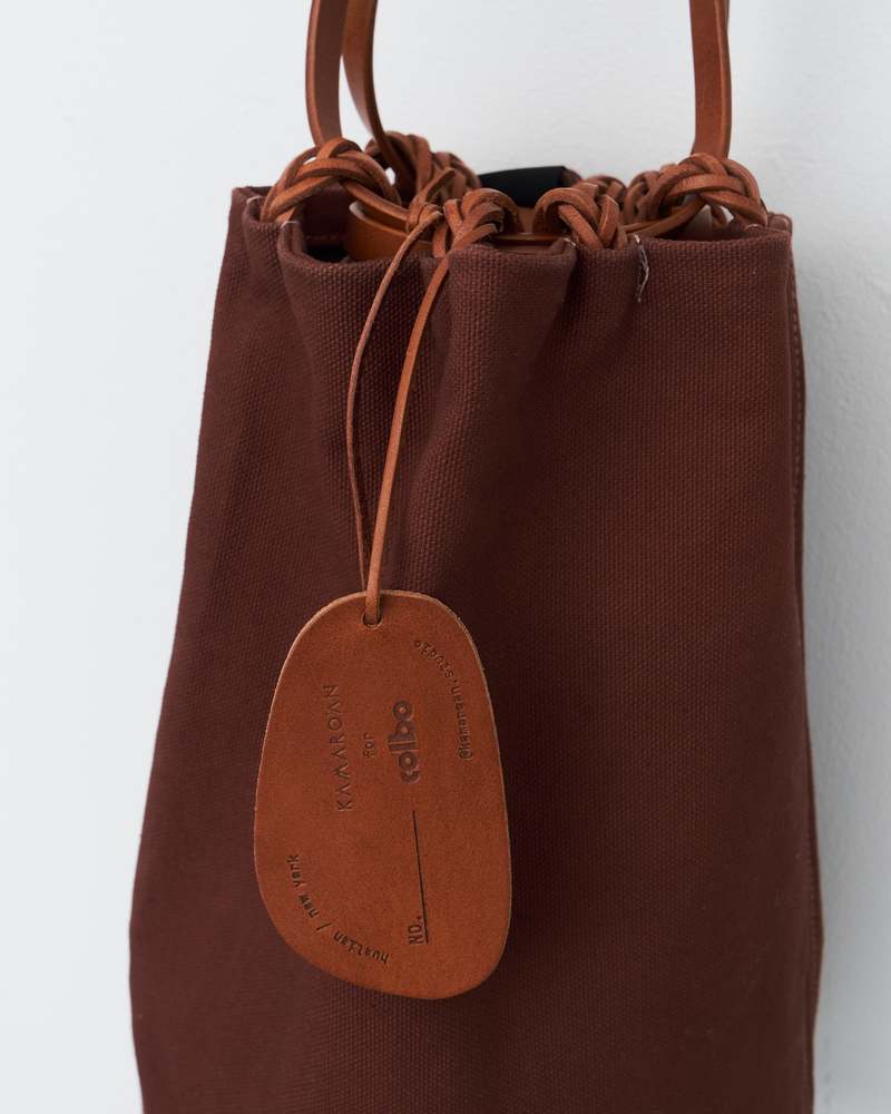 KAMARO'AN Naturally Dyed Woven Drawstring Bucket Bag
