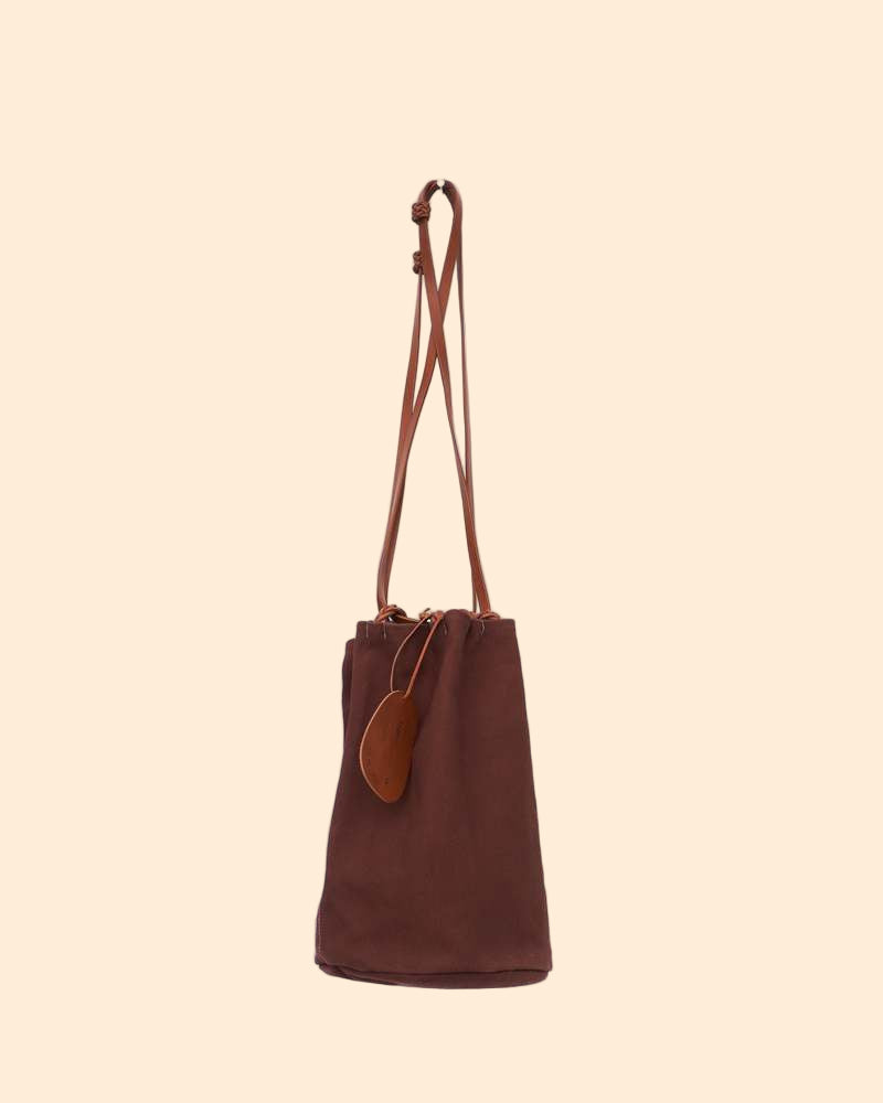 KAMARO'AN Naturally Dyed Woven Drawstring Bucket Bag